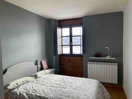 Postel nebo postele na pokoji v ubytování Apartamento en residencial formigal