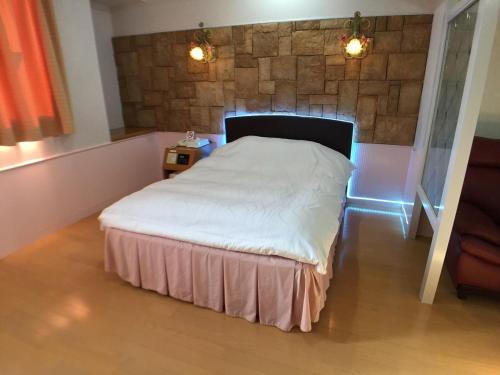 מיטה או מיטות בחדר ב-Hotel La Rouge - Vacation STAY 89068v