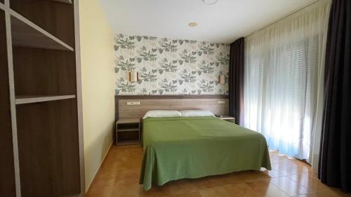 Кровать или кровати в номере Hotel Atlántico Sanxenxo
