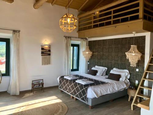 Posteľ alebo postele v izbe v ubytovaní Villa Vager Mani Hotel