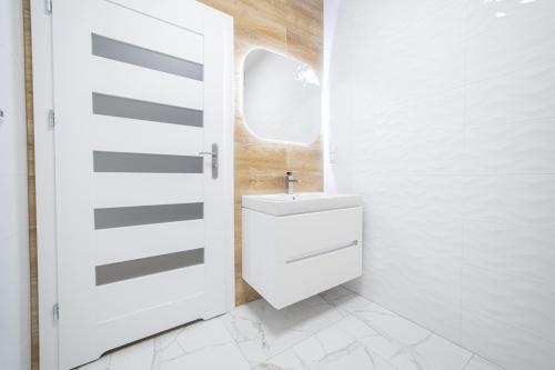 Ванная комната в VacationClub – Zdrojowa 7 Apartament 9