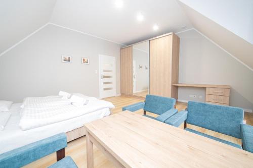 Кровать или кровати в номере VacationClub – Zdrojowa 7 Apartament 9
