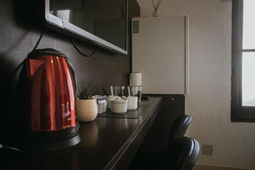 Kemudahan buat kopi dan teh di Tempo Apartamento