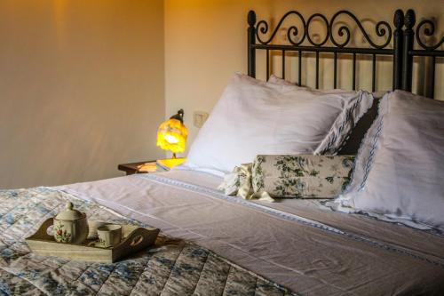 Ένα ή περισσότερα κρεβάτια σε δωμάτιο στο Agriturismo Dandelion