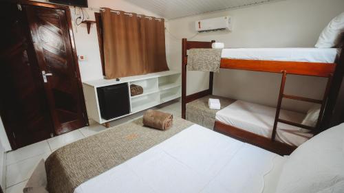 Postel nebo postele na pokoji v ubytování Pousada e Restaurante Tia Lita