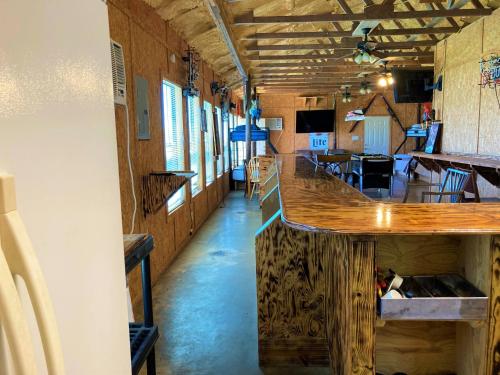 a bar in the middle of a train car at Outback Campground and Marina in Trinity