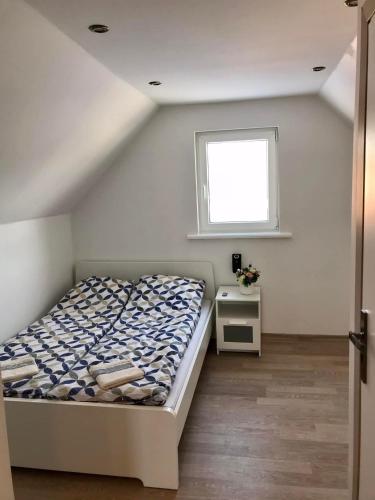 En eller flere senge i et værelse på Karčiama