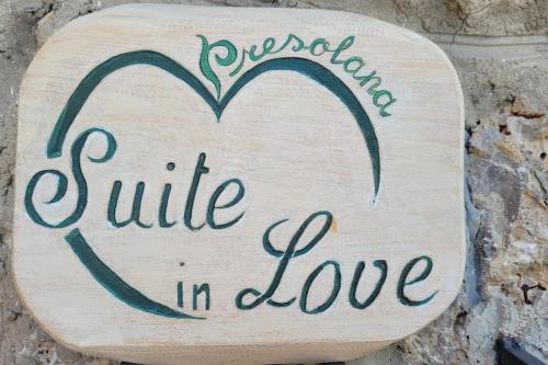 a sign that reads sympathy smile in love at Presolana Suite in Love casa vacanza in Castione della Presolana