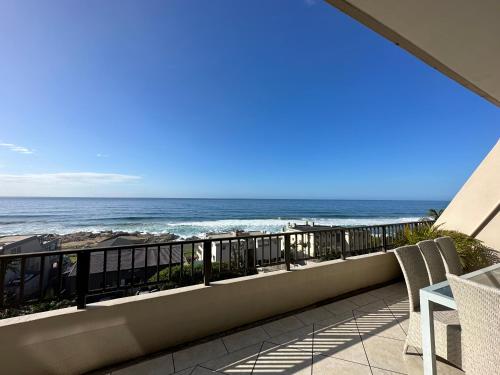 a balcony with a view of the ocean at Chamonix 16 in Margate
