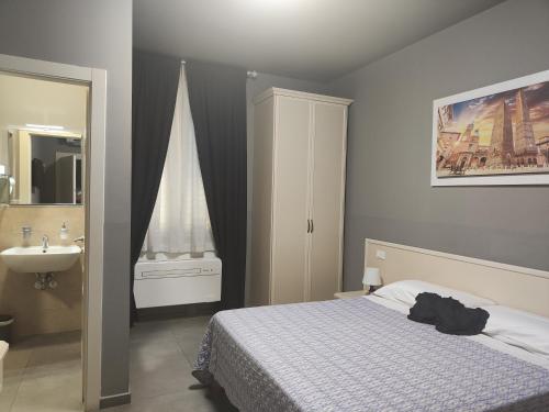 Postel nebo postele na pokoji v ubytování Casa Ambra