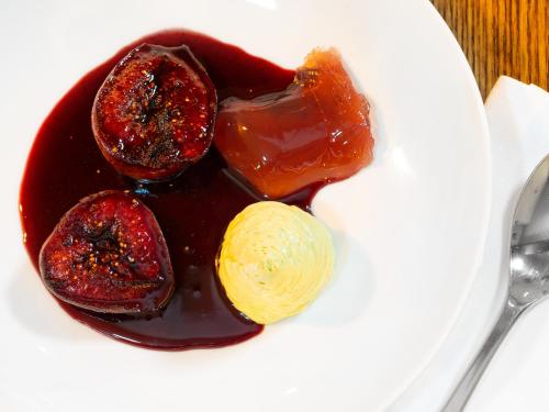 a white plate with chocolate and caramel on it at McGettigan's Townhouse - Olives & Figs Bistro in Dublin
