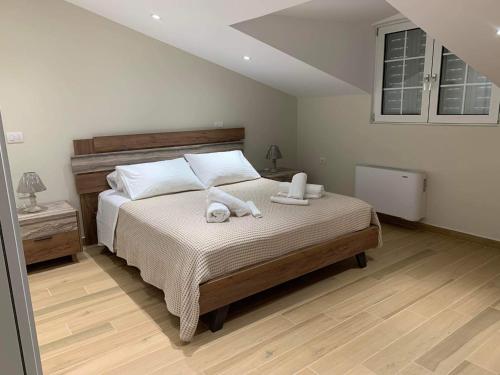 Posteľ alebo postele v izbe v ubytovaní Moulinos Loft