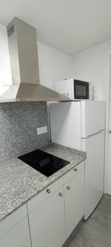 Kuchyňa alebo kuchynka v ubytovaní Casa Peregrina