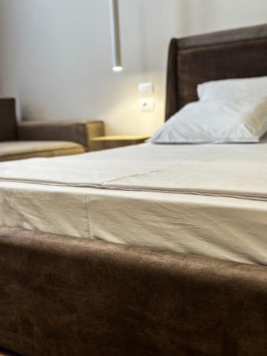 ALEXANDER Rooms & Apartmentsにあるベッド