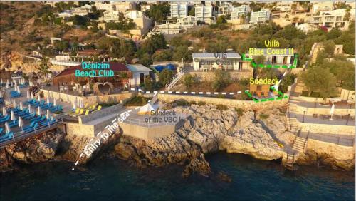 an aerial view of a resort next to the water at Villa Blue Coast I & II wBeach and Great Sea View - KALKAN in Kas