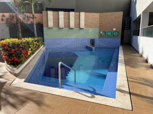 Bazén v ubytování Flat 405 - Condomínio Veredas do Rio Quente - Diferenciado com ar na sala e no quarto nebo v jeho okolí