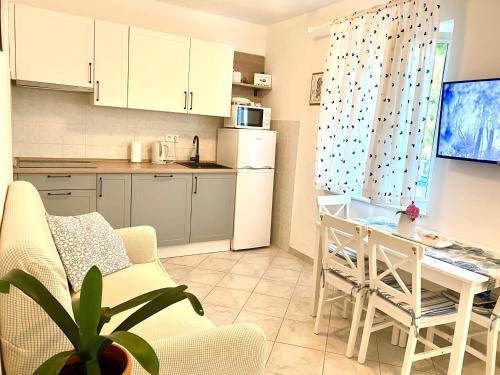 Kuchyň nebo kuchyňský kout v ubytování Holiday Home Casa Bianca