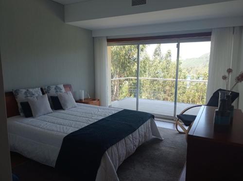 Postel nebo postele na pokoji v ubytování Casa dos Sobreiros