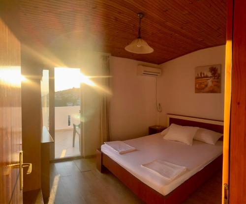 Postel nebo postele na pokoji v ubytování Apartments Cobaj