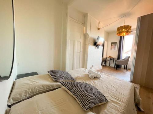 מיטה או מיטות בחדר ב-Suite Nairobi