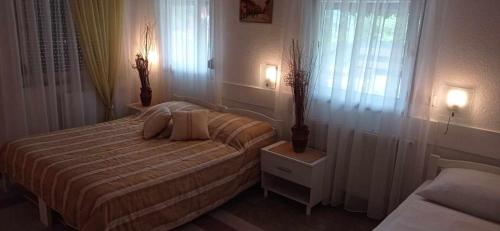 Łóżko lub łóżka w pokoju w obiekcie Holiday Home Casa Rondo