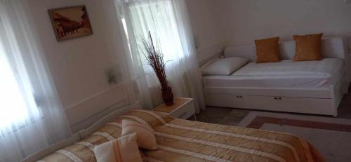 Tempat tidur dalam kamar di Holiday Home Casa Rondo