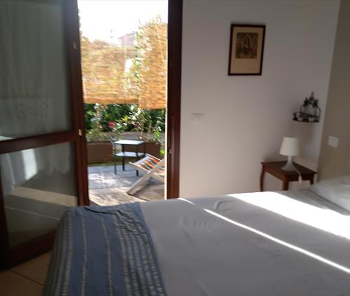 Ліжко або ліжка в номері A10 nel borgo- con giardino vista mare