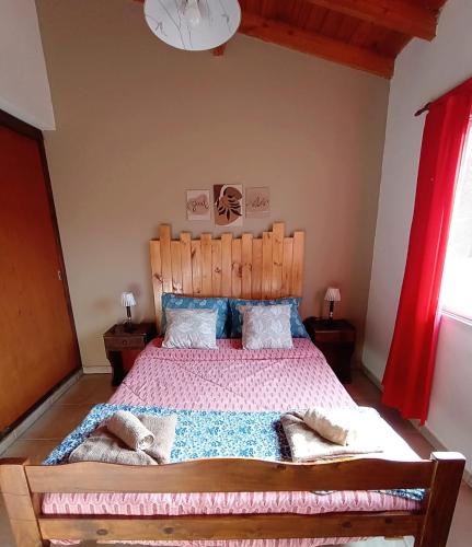 Ένα ή περισσότερα κρεβάτια σε δωμάτιο στο Open Beach