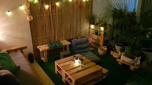 a living room with a couch and a coffee table at Bahay ni Asik - Homestay in Davao City