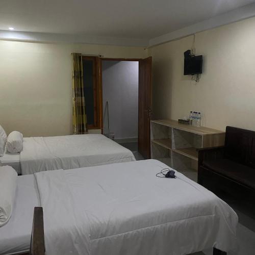 Postel nebo postele na pokoji v ubytování Pesona bali Room and restaurant