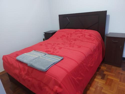 מיטה או מיטות בחדר ב-Acogedora Estancia en La Paz, Garzonier con Garaje