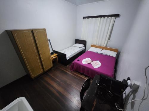 Postel nebo postele na pokoji v ubytování Hotel Real Koerich 24h