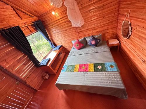 Кровать или кровати в номере Kiên Mán Homestay