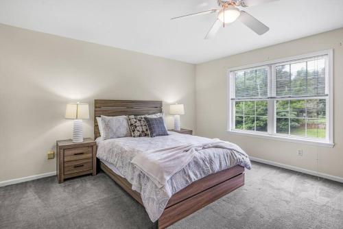 a bedroom with a bed and a window at Ultimate Retreat @ Papermill Rd in Newark