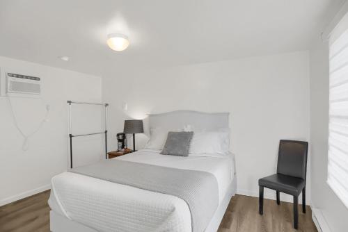 Ένα ή περισσότερα κρεβάτια σε δωμάτιο στο Halifax Inn