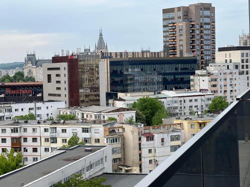 a view of a city from the roof of a building at Studios & Apartments Palas by Glam at Lazar Towers in Iaşi