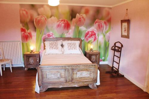 Ένα ή περισσότερα κρεβάτια σε δωμάτιο στο 1843 le ruisseau du moulin