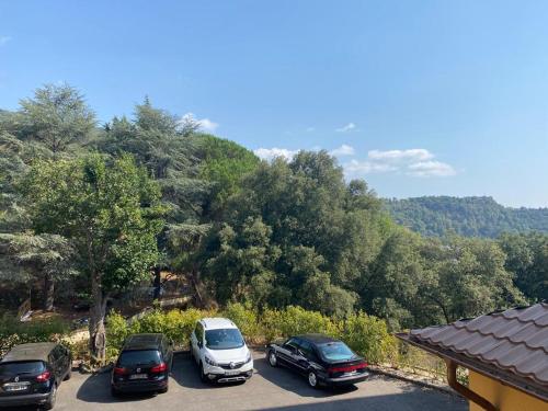 a group of cars parked in a parking lot at Domaine des Anges in Amélie-les-Bains-Palalda