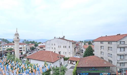 a view of a city with flags on buildings at Hotel Ipekyolu in Sapanca