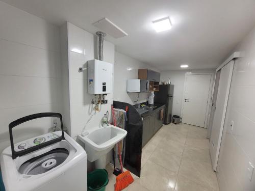 Praia Dos Anjos Residence clubにあるキッチンまたは簡易キッチン