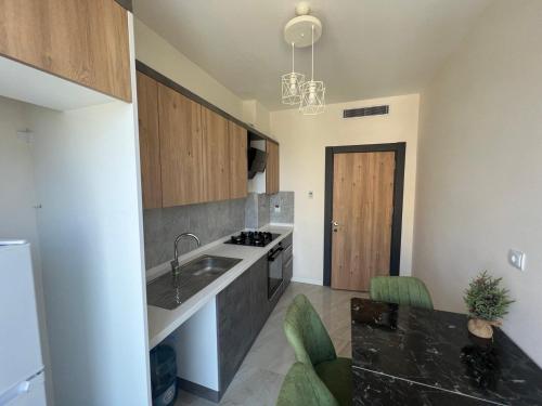 a kitchen with a sink and a counter top at Antalya apartment in Antalya