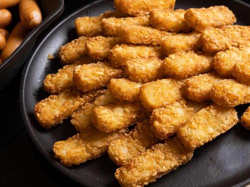 a plate of chicken nuggets sitting on a plate at La'gent Hotel Kyoto Nijo in Kyoto