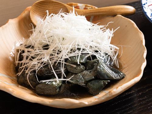 a bowl of food with noodles on top of it at La'gent Hotel Kyoto Nijo in Kyoto