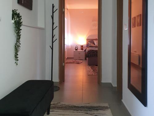 Postel nebo postele na pokoji v ubytování Afrodita apartment