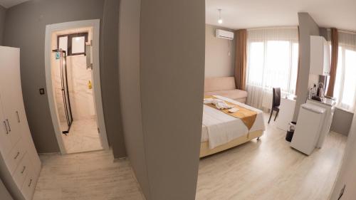 Katil atau katil-katil dalam bilik di MY HOME IN TRABZON