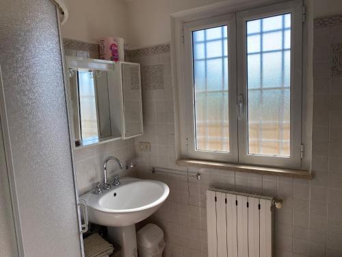A bathroom at Casa versilia