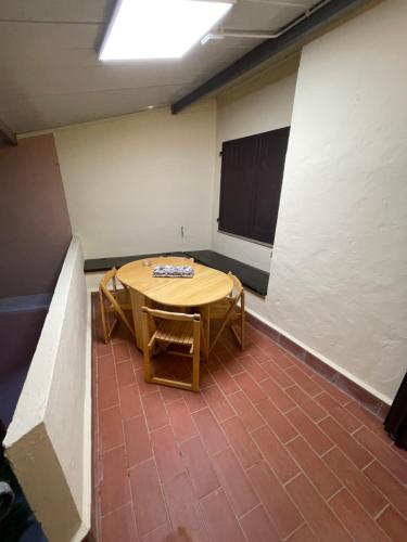 a room with a table and chairs in it at Casa Gabry e Lory in Fort Village