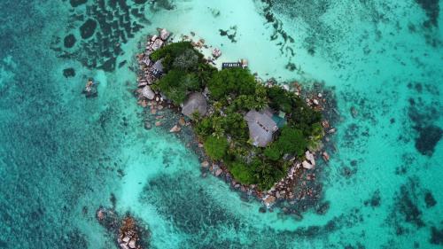 an island in the shape of a heart in the ocean at Chauve Souris Relais in Anse Volbert Village