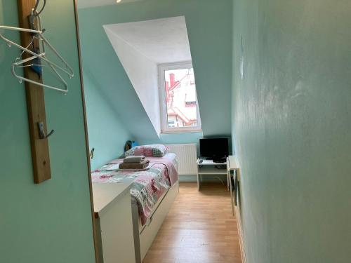 Postel nebo postele na pokoji v ubytování Loft apartment Svahova 6