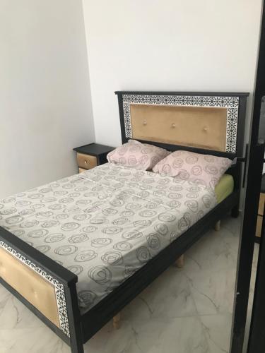 Krevet ili kreveti u jedinici u okviru objekta Appartement Vue sur mer Al Hoceima